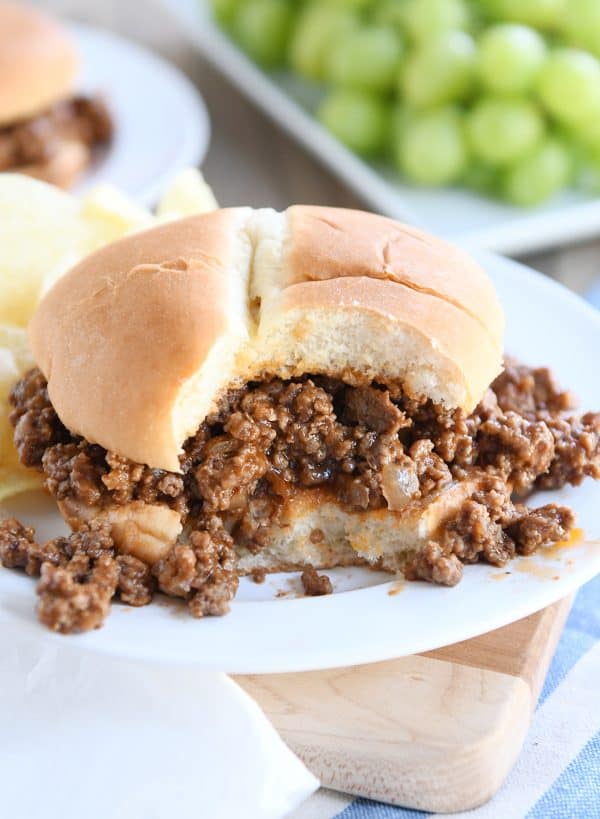 sloppy joe on white plate with bite taken out