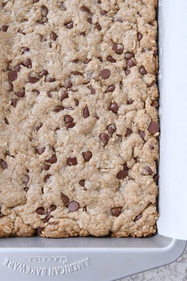 Baked easy oatmeal chocolate chip coconut cookie bars in 9X13-inch pan.