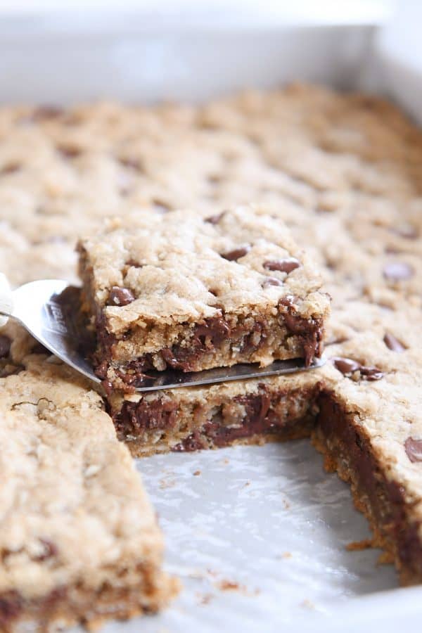 oatmeal chocolate chip coconut cookie bar on spatula