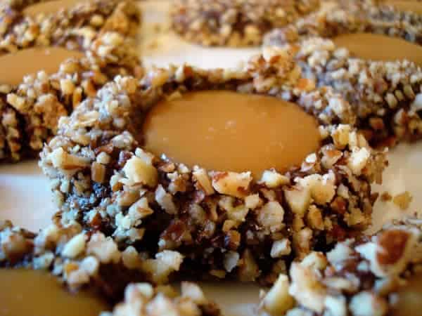 chocolate thumbprint cookie with caramel on the inside