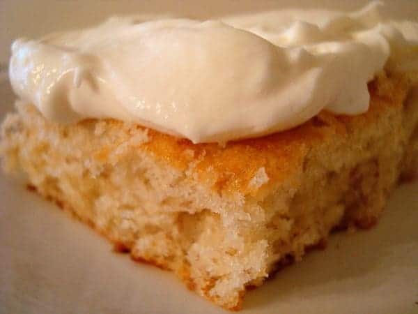 Banana bar topped with whipped frosting.