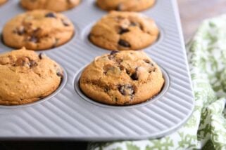 pumpkin chocolate chip muffin in muffin tin