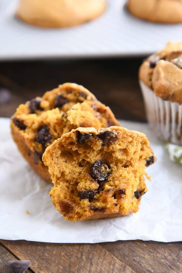 Pumpkin chocolate chip muffin split in half.