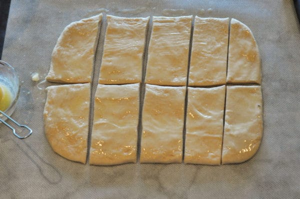 bread dough cut into 10 small rectangles