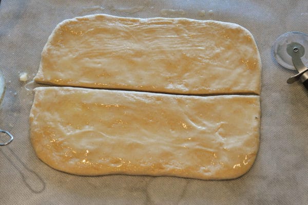 bread dough cut into two long rectangles
