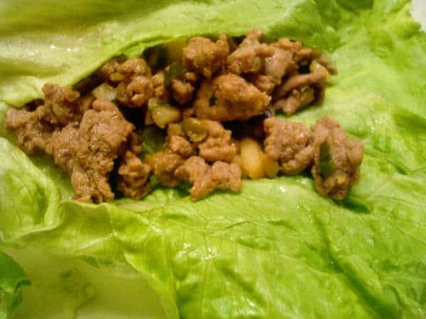 Ground turkey in a piece of lettuce.