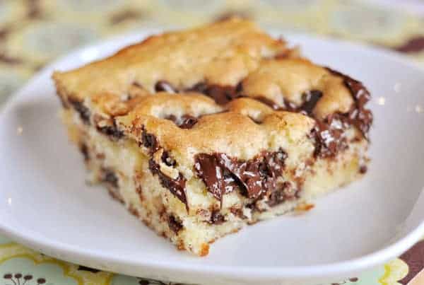 piece of chocolate chip cake on a white plate