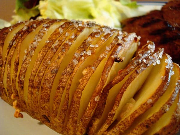 Baked potato sliced into thin slices.