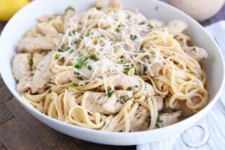 lemon chicken pasta with Parmesan in white dish