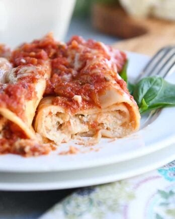 baked manicotti on white plate