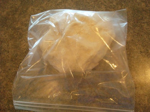 bread dough placed in Ziploc bag to rise