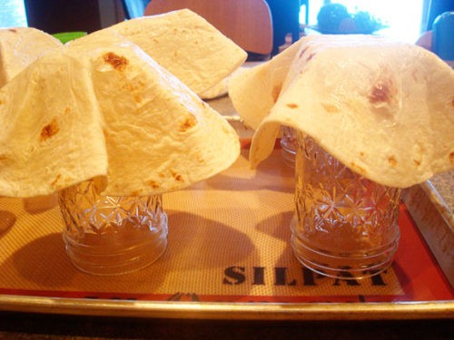 tortillas draped on top of mason jars