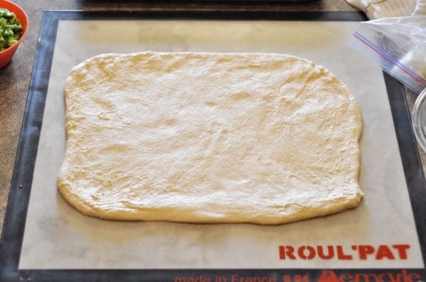 dough rolled into a rectangle on a Roul'pat