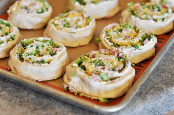 sheet pan with uncooked filled pinwheel rolls