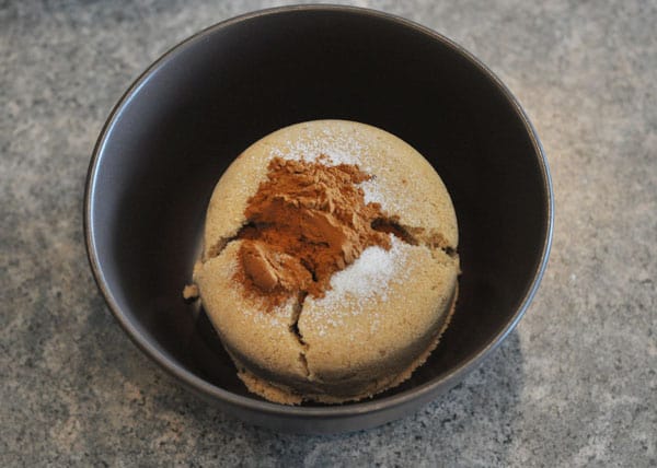 brown sugar and cinnamon in a black bowl