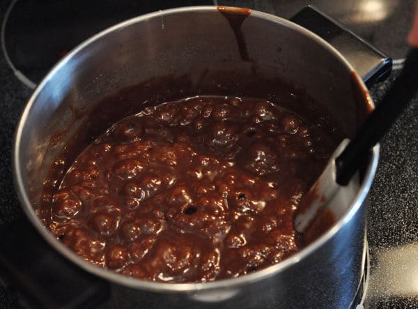 chocolate caramel mixture with a rapid boil in a large stainless steel pot