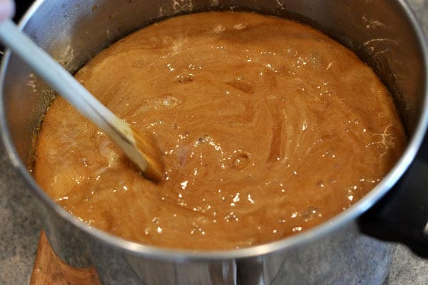 golden brown toffee mixture in a saucepan