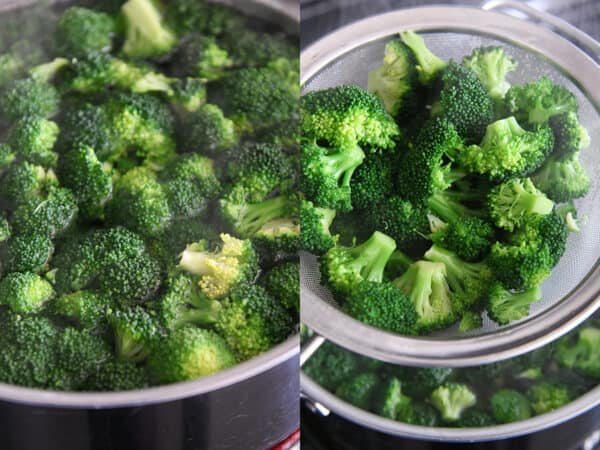 raw broccoli cooking in pasta water