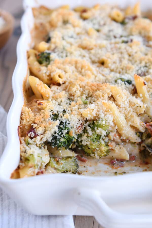 Casserole dish with baked penne and bread crumbs.