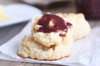 Easy flaky buttermilk drop biscuit with butter and jam.