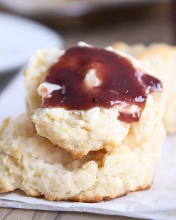 Easy flaky buttermilk drop biscuit with butter and jam.