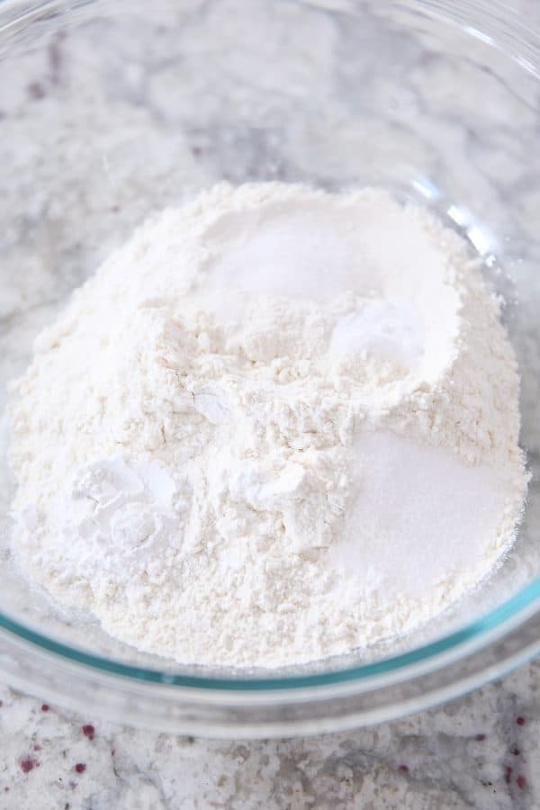 Dry ingredients in glass bowl for drop biscuits