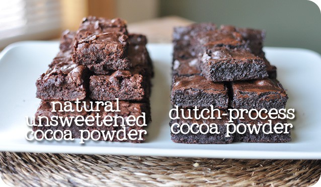 two stacks of brownies on a white platter, the left stack says natural unsweetened cocoa powder, and the right stack is darker and says dutch-process cocoa powder