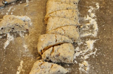 uncooked scones cut into triangles ready to be baked