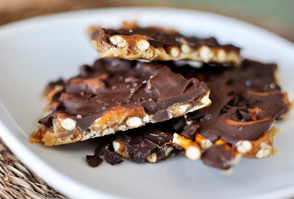 A plate of caramel, chocolate, pretzel bark. 