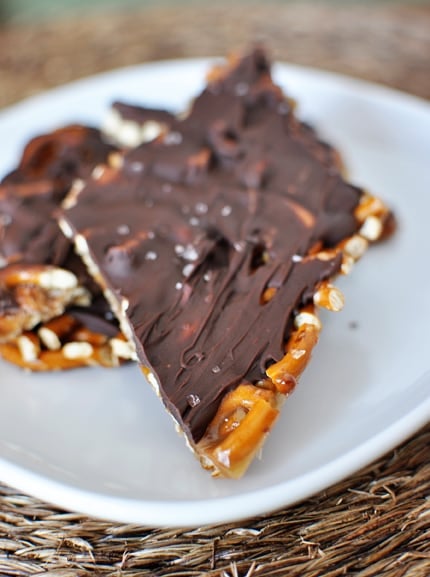 A plate of caramel, chocolate, pretzel bark.