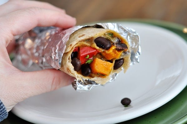 Inside view of a sweet potato and black bean burrito.