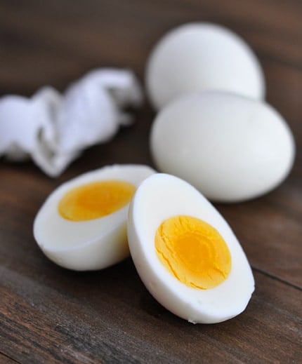 A hard-boiled egg cut in half.