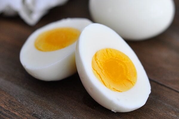 A hard boiled egg cut in half.