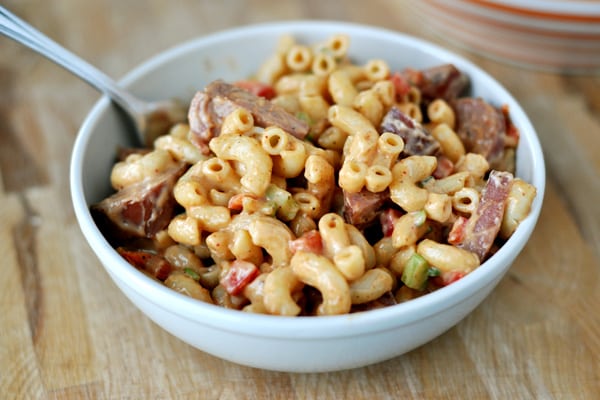 white bowl of barbecue macaroni salad with ham and elbow noodles