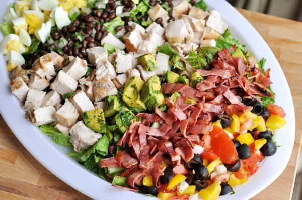 Chopped cobb salad on a white platter.