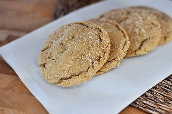 Four brown sugar crackel cookies lined up in a row.