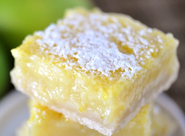 Top view of a powdered sugar dusted lime shortbread bar.