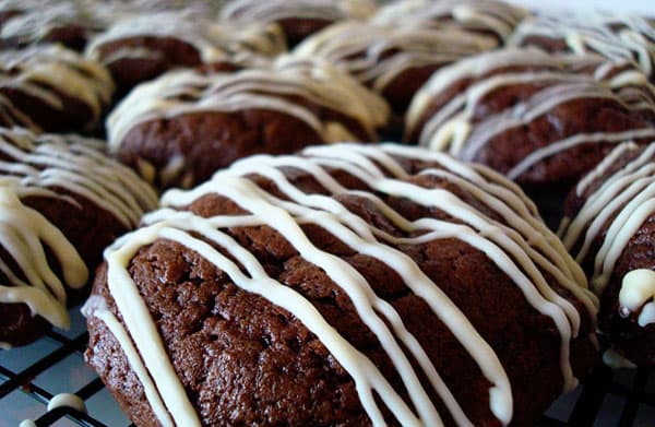 Chocolate brownie-like drops with white icing.