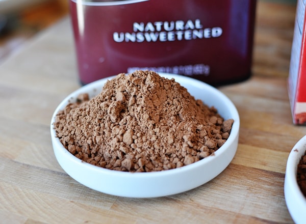 Hersheys natural unsweetened cocoa scooped into a white bowl