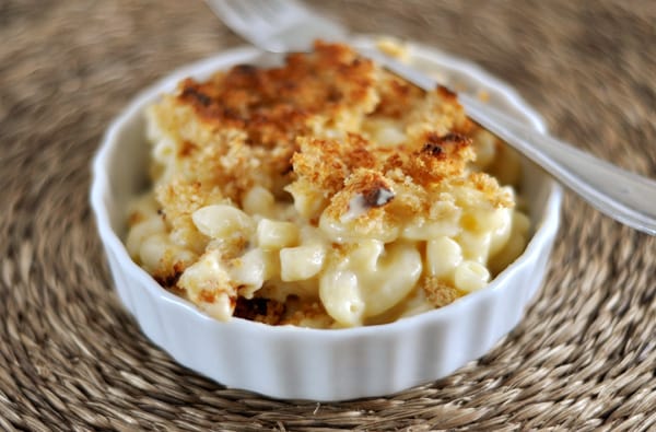 A white ramekin with panko-topped macaroni and cheese.