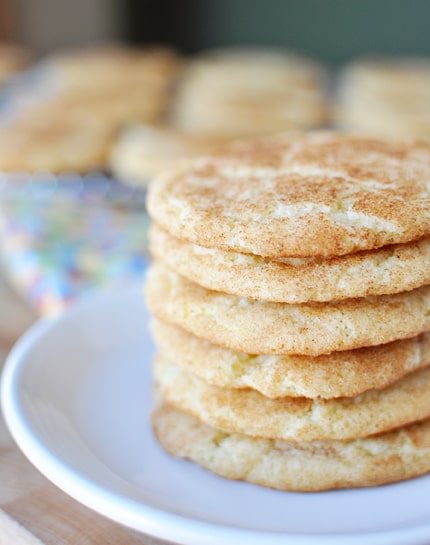White plate with a stack of six snickerdoodles.
