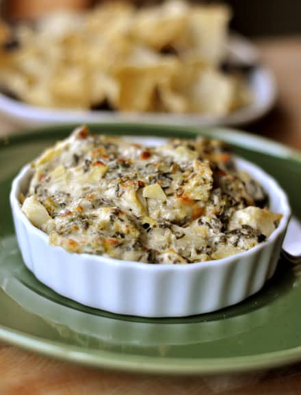 spinach artichoke dip in a white ramekin