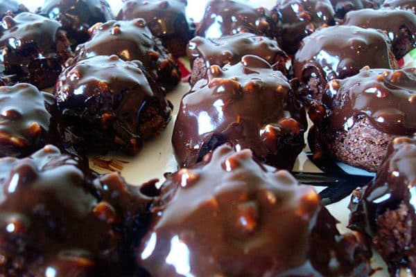 a platter of glazed brownie bites