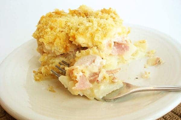 white plate with a serving of chicken cordon bleu casserole