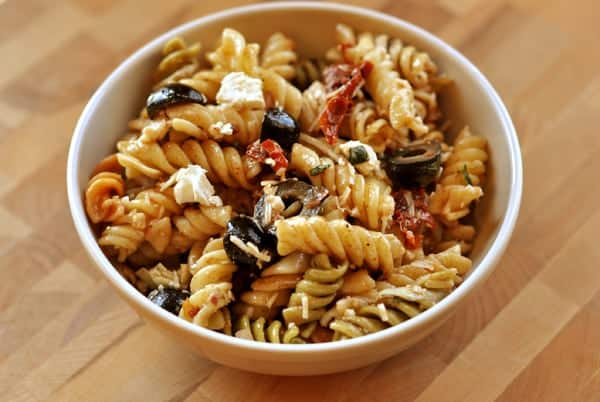 White bowl filled with pasta salad.