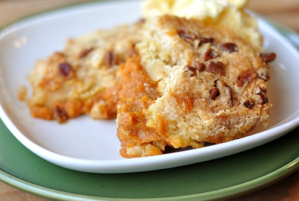 White plate with pumpkin cobbler.