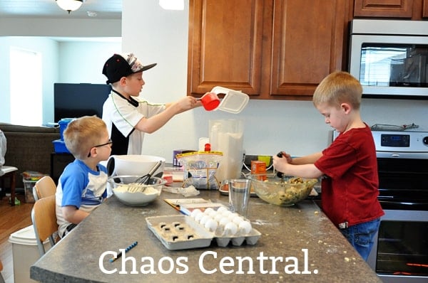 three little boys cooking together