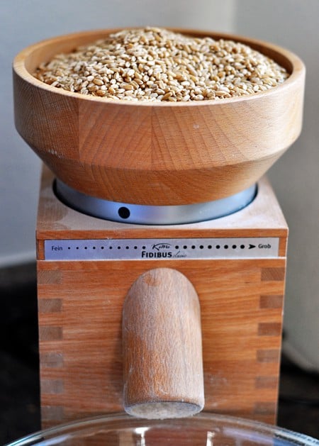 Here is our KitchenAid grain mill in action with fresh quinoa