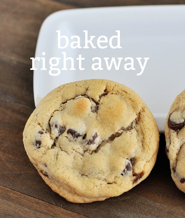 top view of a chocolate chip cookie with the text baked right away over the top of the cookie