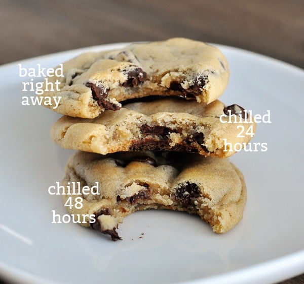 three stacked chocolate chip cookies with bites taken out of each one